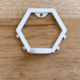White modular golf ball display mount shown from the front