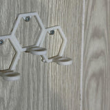 Empty modular golf ball wall mount, angled view
